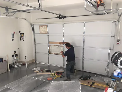 Garage Door Panel Repair in Stow