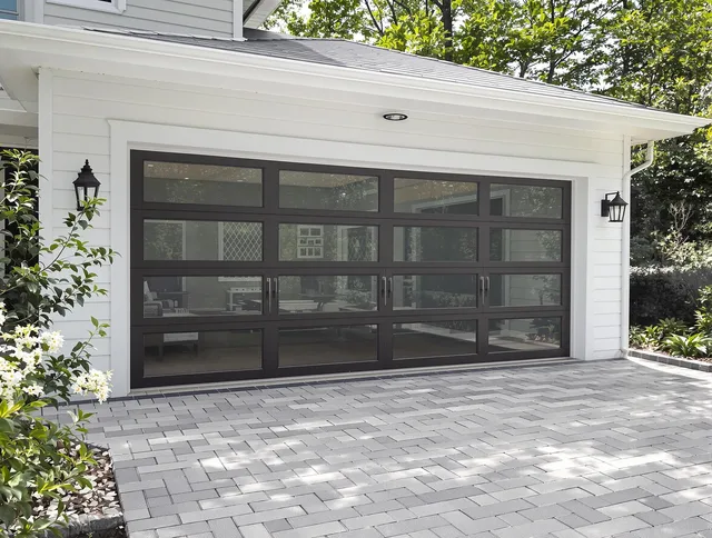 Stow Garage Door Repair design specialist presenting custom garage door options to Stow homeowner