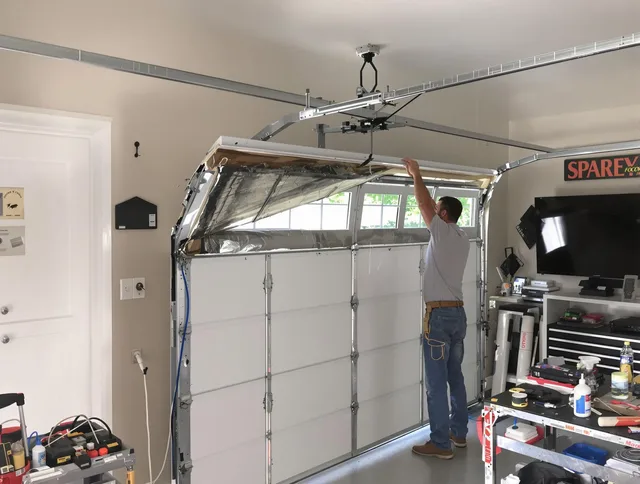 Garage door section replacement by Stow Garage Door Repair in Stow