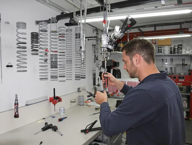 Stow Garage Door Repair safety certified technician performing precision spring replacement in Stow