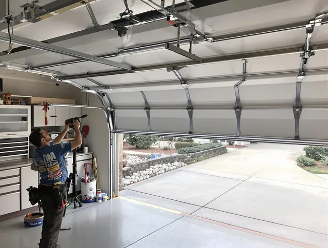Garage door track repair service by Stow Garage Door Repair in Stow